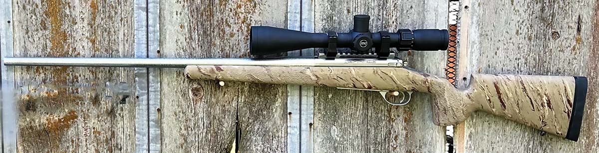 A level three rifle used mainly for coyote/antelope hunting. A Sightron S-TAC scope is on top of a Defiance Tenacity action bedded in a McMillian Game Warden stock with a Lilja barrel. A Timney trigger is ready to ignite the 6 mm Remington Ackley Improved round.